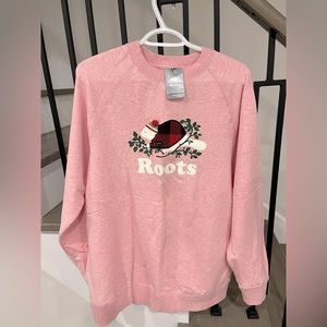 Brand new women Roots sweater with tag. Size: S (loose fit)